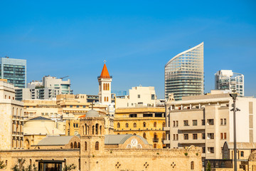 Fototapeta na wymiar Saint George Greek Ortodox cathedral in the dowtnown of Beirut among modern buildings, Lebanon