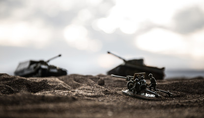 War Concept. Military silhouettes fighting scene on war fog sky background, World War German Tanks Silhouettes Below Cloudy Skyline At night. Attack scene.