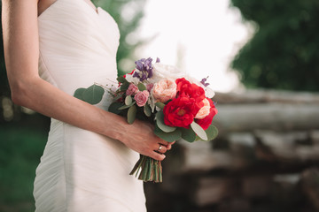 close up.wedding bouquet in the hands of the bride.