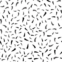 Seamless abstract strokes pattern in black and white.