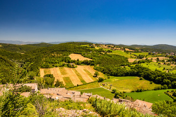 The green Umbrian hills seen from the top of the city of Amelia, in Umbria. The rich vegetation,...