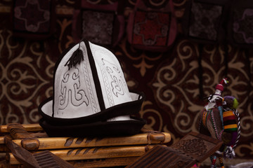 Traditional Kazakh felt headdress in a yurt is the home of nomads. Close-up