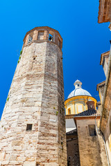 The dome of the cathedral of the city of Amelia with the dodecagonal tower, in Umbria. The crucifix...