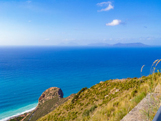 Fototapeta na wymiar Light blue sea water tourquoise water beautiful scenery sicilian beach
