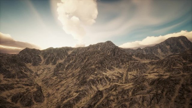 mountain landscape in high altitude with rays of light