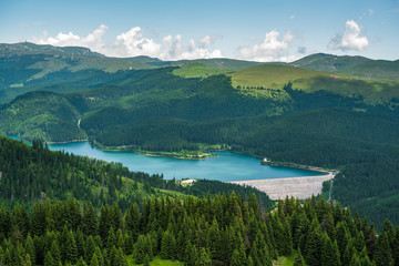 Fototapeta na wymiar Vidraru lake and landscape of the Carpathian Mountains, in Transylvania (Romania)