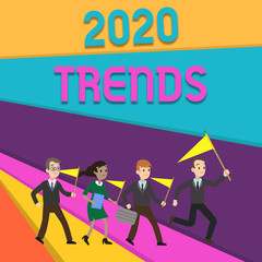Handwriting text writing 2020 Trends. Conceptual photo things that is famous for short period of time in current year People Crowd Flags Pennants Headed by Leader Running Demonstration Meeting