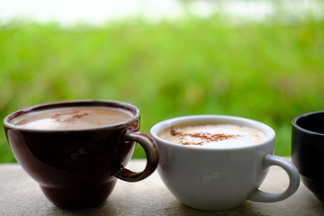 cup of coffee on wooden table