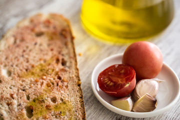 Fototapeta na wymiar Bread with tomato and olive oil