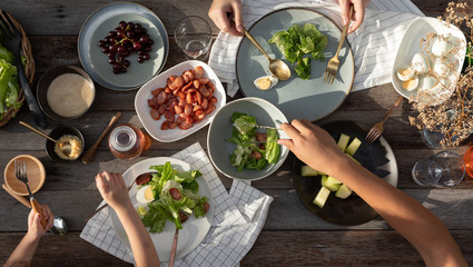 Woman and man dinner with organic salad, Food healthy organic vegetable concept with top view