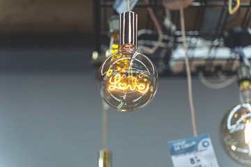A bulb with the words "love"