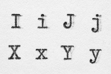 Real typewriter font alphabet with letters I, J, X, Y