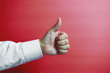 Businessman's hand showing good. グッドを表すビジネスマンの手	