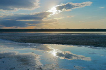 Deserted coast of salty estuary.