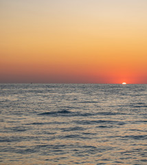Fototapeta na wymiar Sunset over the black sea in summer