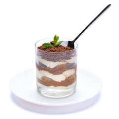 Classic tiramisu dessert in a glass cup on the plate on white background with clipping path