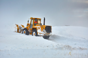 Snowblower at work in the mountains