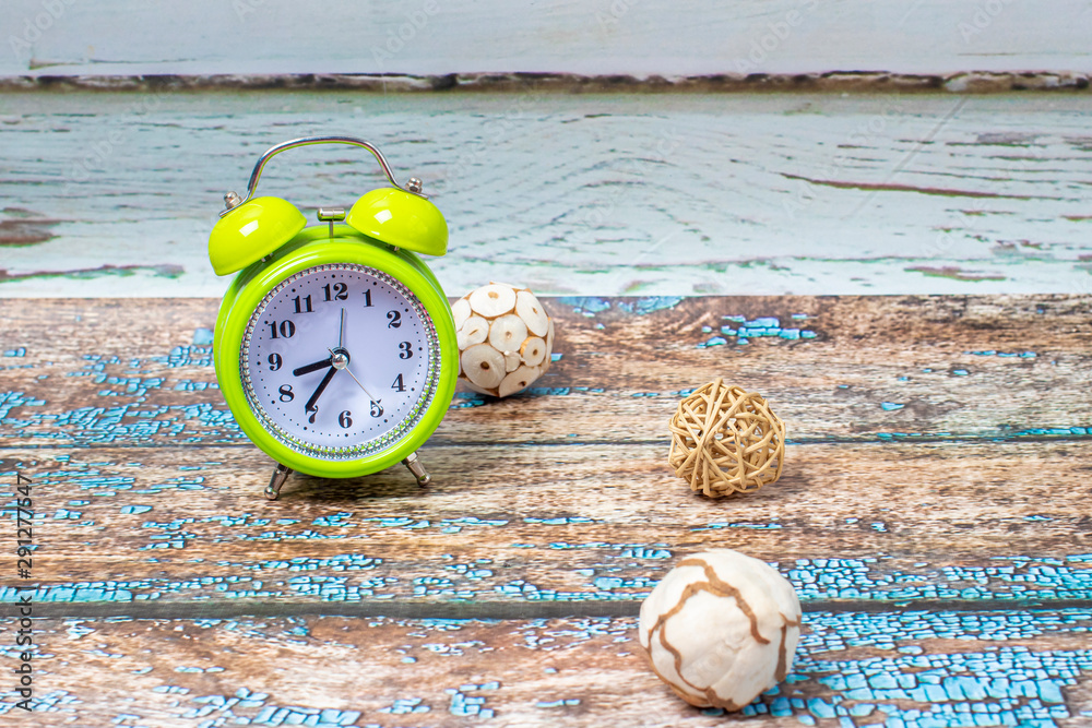 Wall mural view of a green classic alarm clock