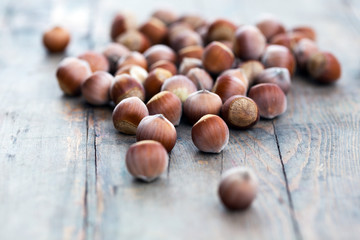 hazelnut on wooden background