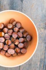 hazelnut on wooden background