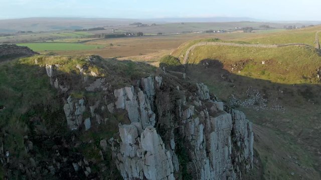 Aerial, forward reveal, Sycamore Gap, Whin Sill, Hadrian's Wall