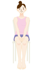 椅子に座る女性