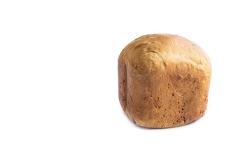 homemade white bread from a bread machine with a brown crust isolated on white