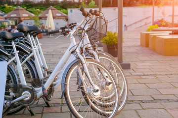 Fototapeta na wymiar city parking of electric bikes rental in a residential area