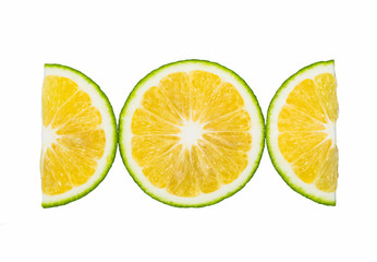 close up of green orange slices isolated on white background.