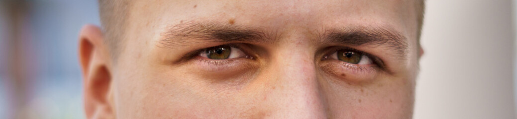 Close up of the eyes of a young man