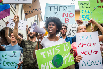 Activists demonstrating against global warming - obrazy, fototapety, plakaty