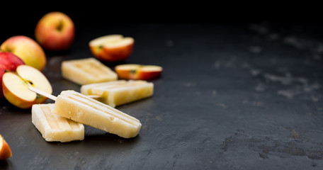 Fresh made Apple Popsicles (selective focus)