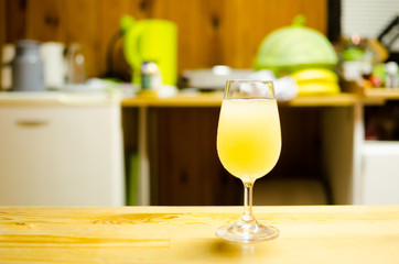 Glass of new half fermented wine