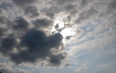 The morning sun is trying to break through the thick clouds