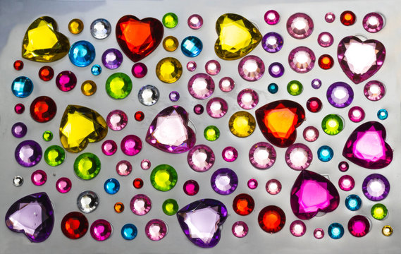 multi-colored rhinestones background. copy space