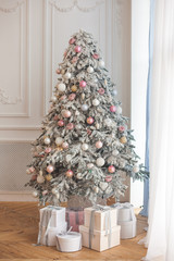 Christmas tree with presents. Xmas background. Holiday decoration