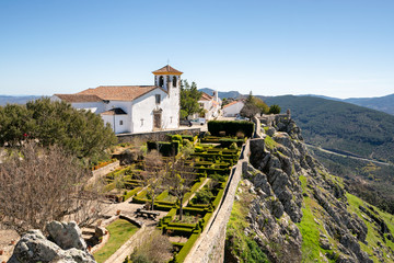 Fototapeta na wymiar Espirito Santo church in Marvao on the middle of a beautiful landscape and city walls
