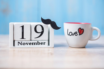 coffee cup, Black mustache and 19 November Calendar.  in the morning. Father, International men day, Prostate Cancer Awareness and World cancer day concept