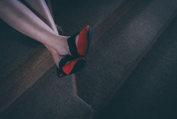 red girl shoes closeup vie in vintage color background