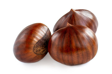 Chestnuts isolated on white background. Ripe sweet Chestnuts for Christmas