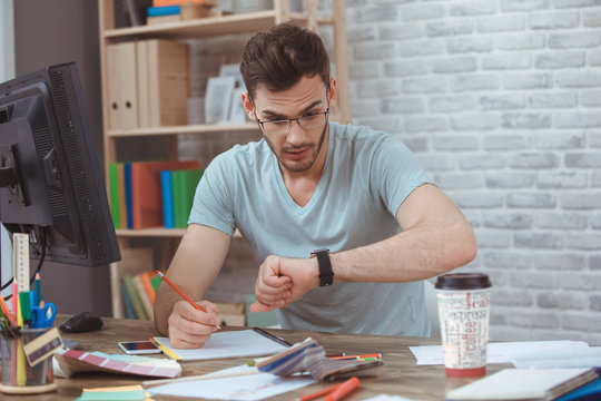 Graphic designer small business home office concept taking notes