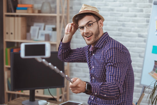 Graphic designer small business home office concept taking photos grimase