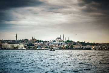 Fototapeta na wymiar Sea with cityscape in the background