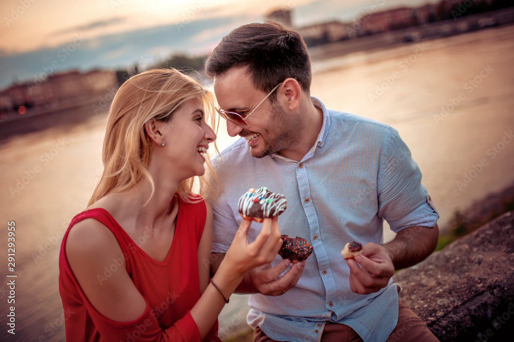 Wall mural lovely couple having fun