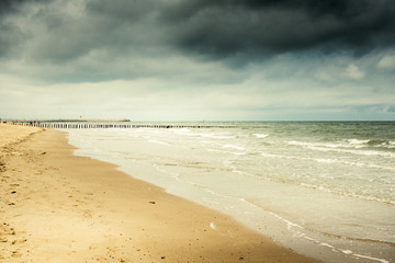 Fototapeta na wymiar North sea against cloudy sky, Belgium