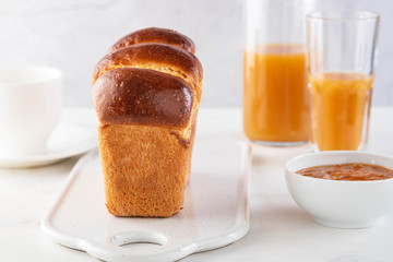 Brioche bread on breakfast table. Continental breakfast. Copy space.