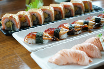 Selective focus of different set of sushi