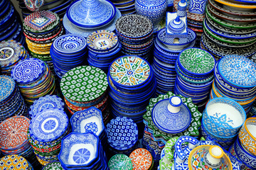 Colorful crafts shop with ceramic art on a traditional moroccan market, Morocco in Africa