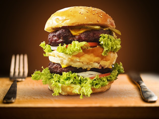 Big and scrumptious hamburger double decker detail or close-up