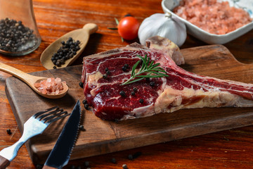 A fresh steak on the chopping board